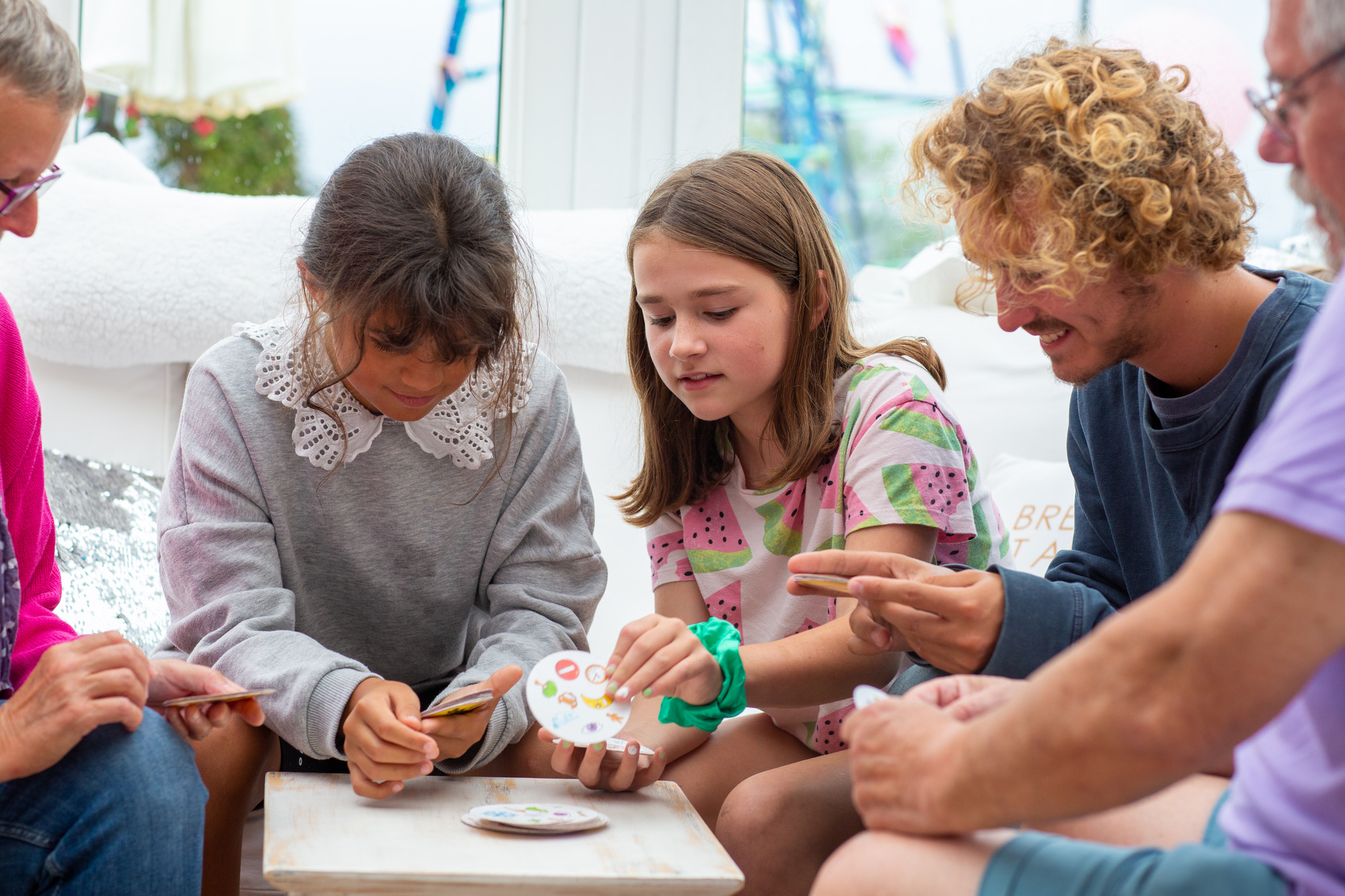 family playing board games
